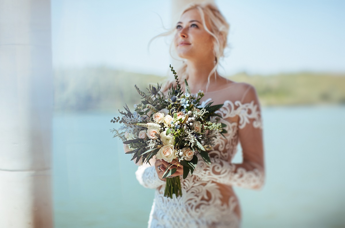 Impressionen Hochzeitsplanung - Braut mit Brautstrauß